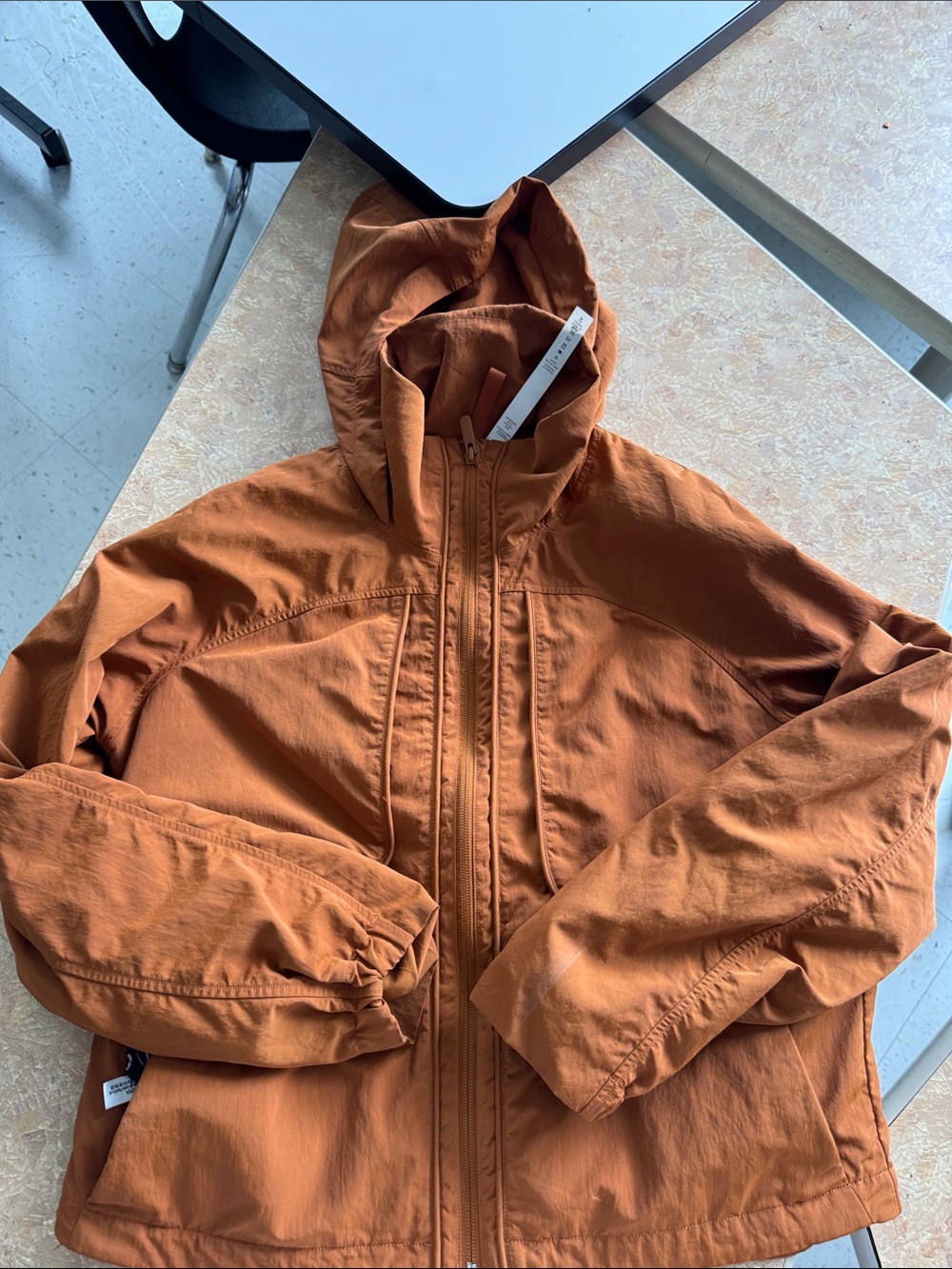Lululemon Packable Hooded Windbreaker Jacket in Rust Orange